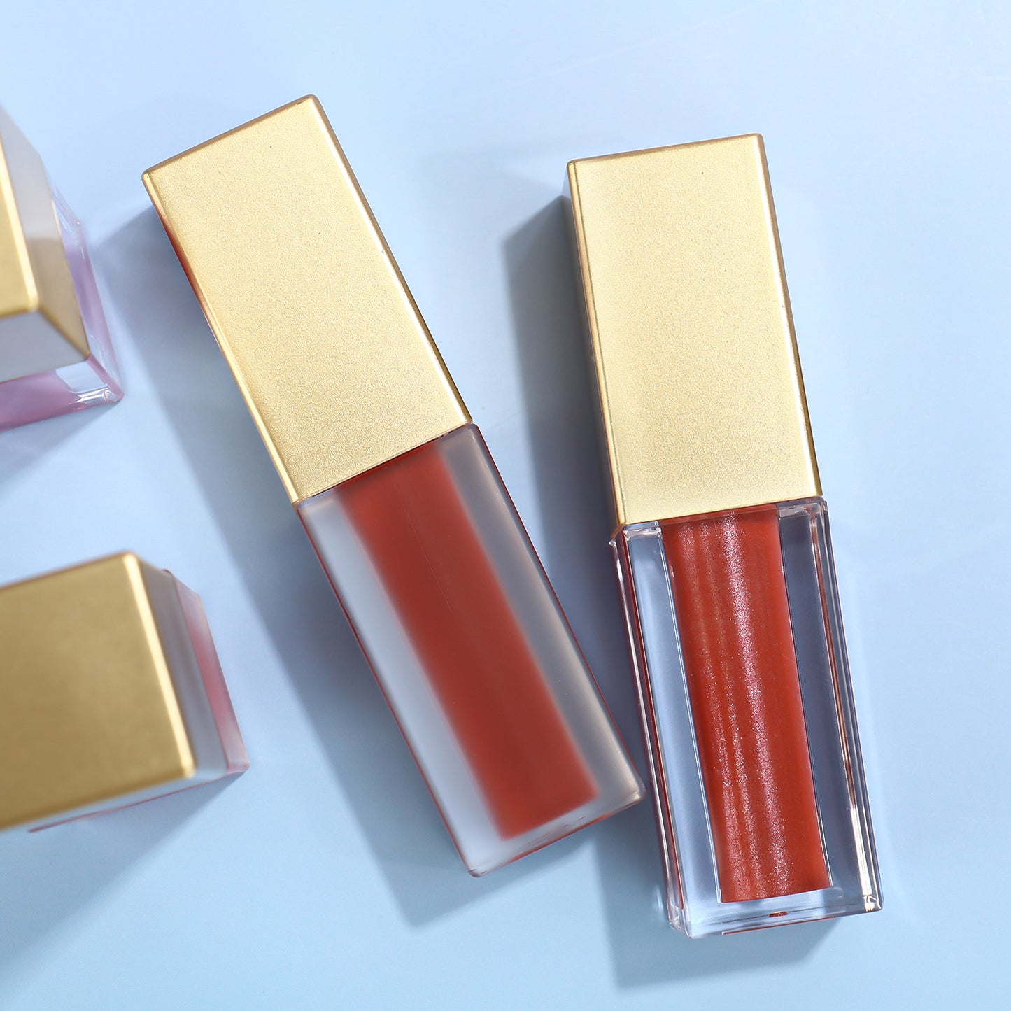 Elegant Gold-Capped Lip Gloss with Square Transparent Design, P31 P129